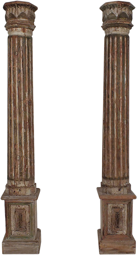 a pair of carved wooden columns