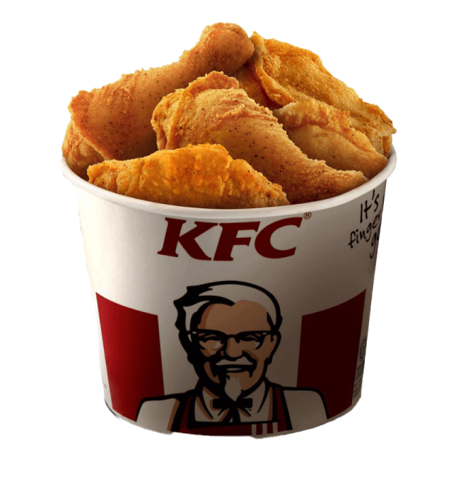 a cup filled with chicken nus on a white background