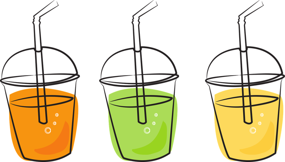 three glasses of juice with straws