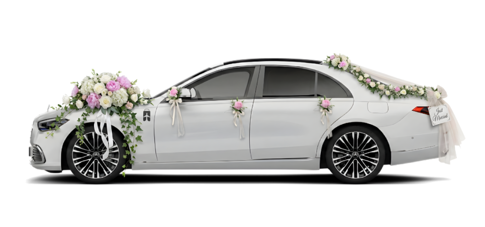 a white car with flowers on the side
