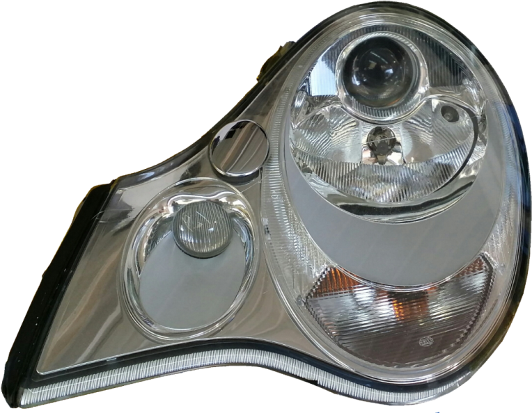 a pair of headlights with chrome housings