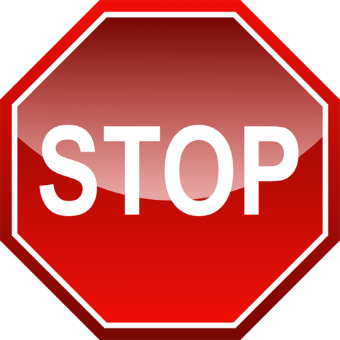 a stop sign with the word stop on it
