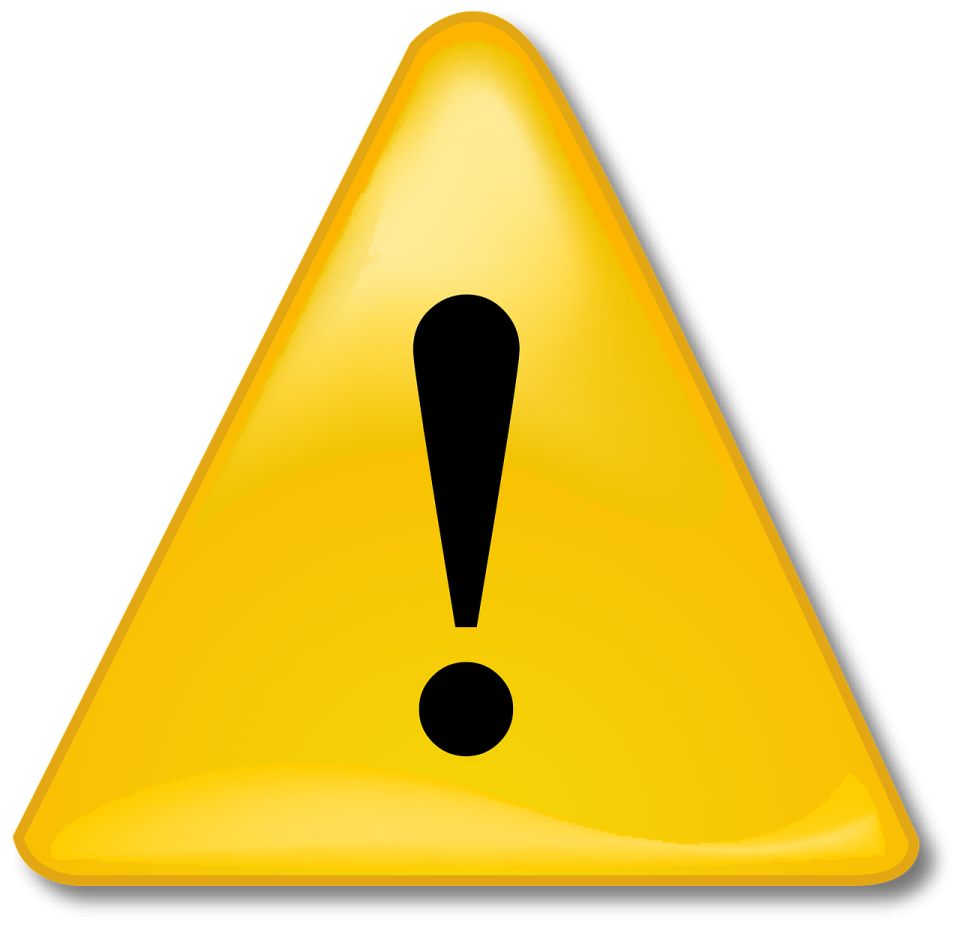 a yellow triangle with a black exor on it