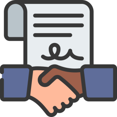 two hands shaking over a document