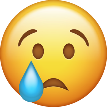 a yellow smiley face with a tear on it