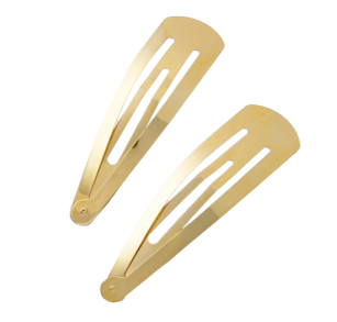 a pair of gold hair clips
