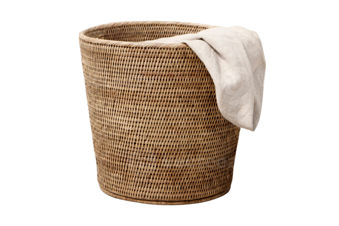 a wicker basket with a towel on top