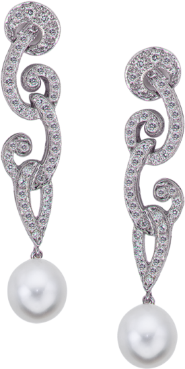 a pair of pearl and diamond earrings