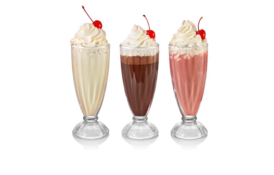 three glasses filled with different types of beverages