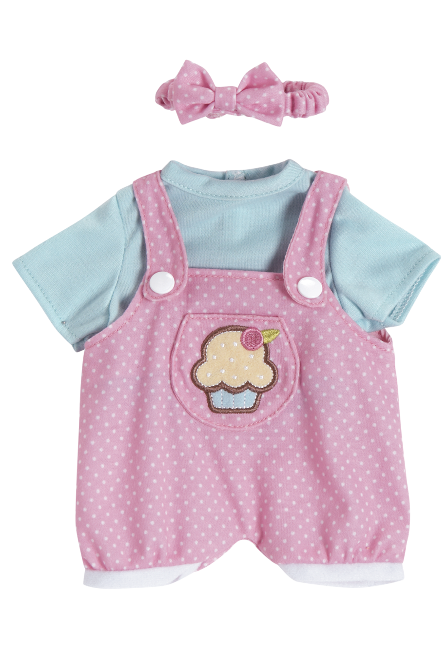 a baby girl's outfit with a cupcake on it