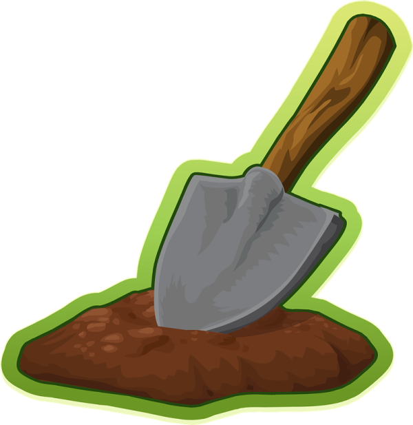 a shovel in the ground
