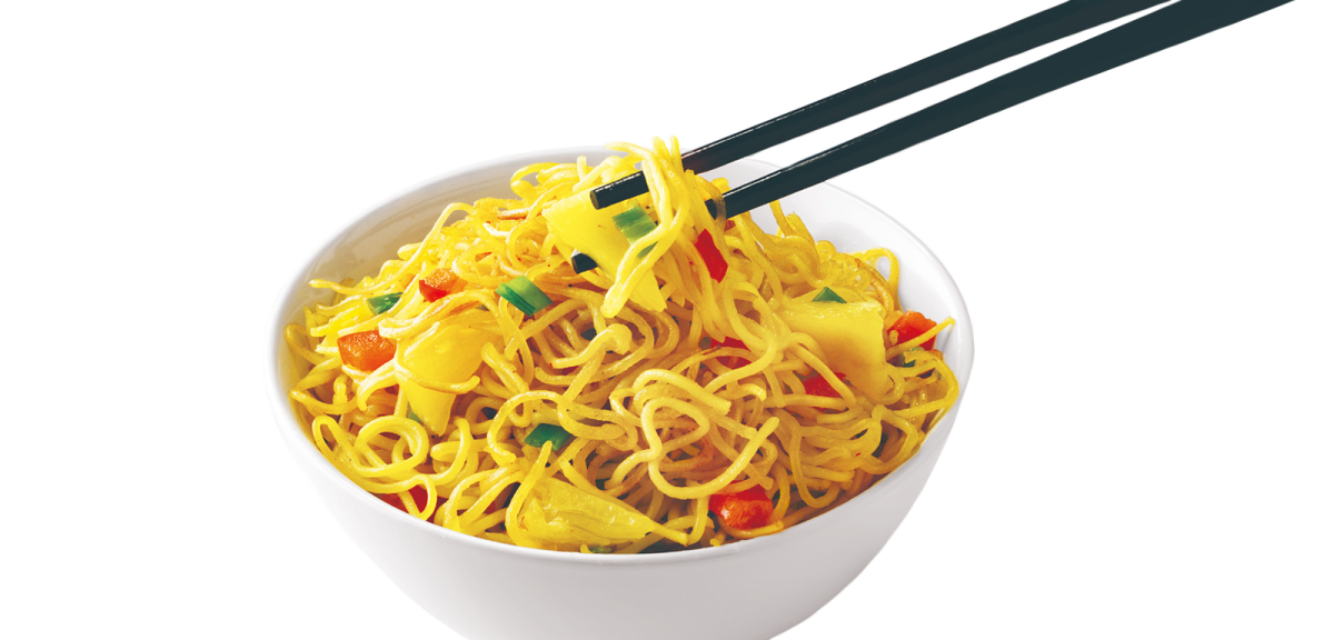 a bowl of noodles with chops in it