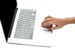 a person is typing on a laptop