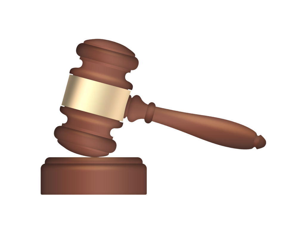a wooden judge's gavette on a white background