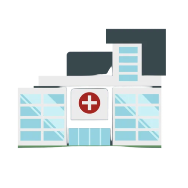 a hospital building with a cross on the front