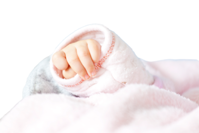 a baby is wrapped up in a blanket