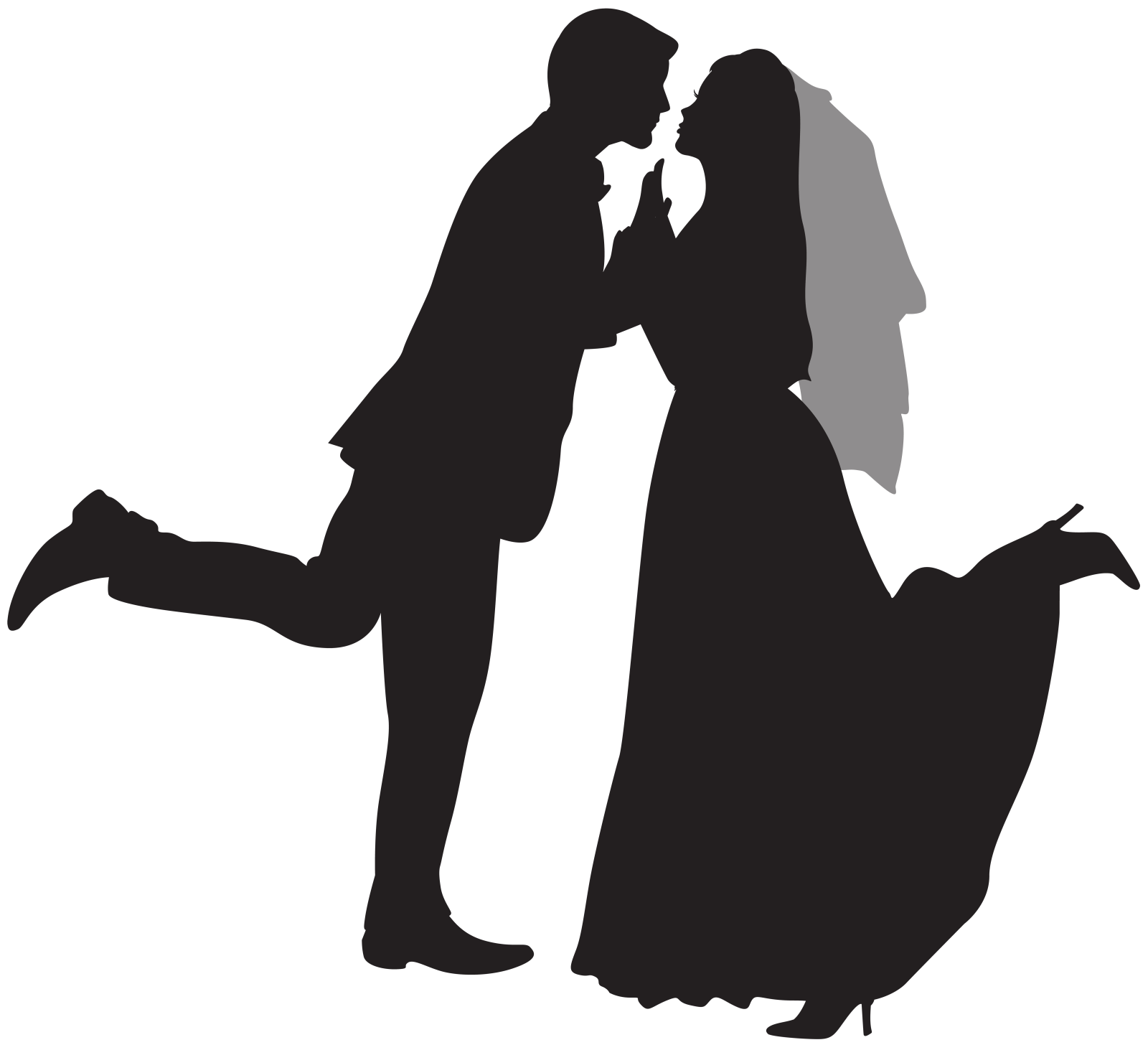 a silhouette of a bride and groom kissing
