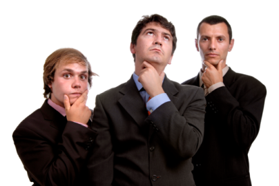 three men in suits are looking up to the sky