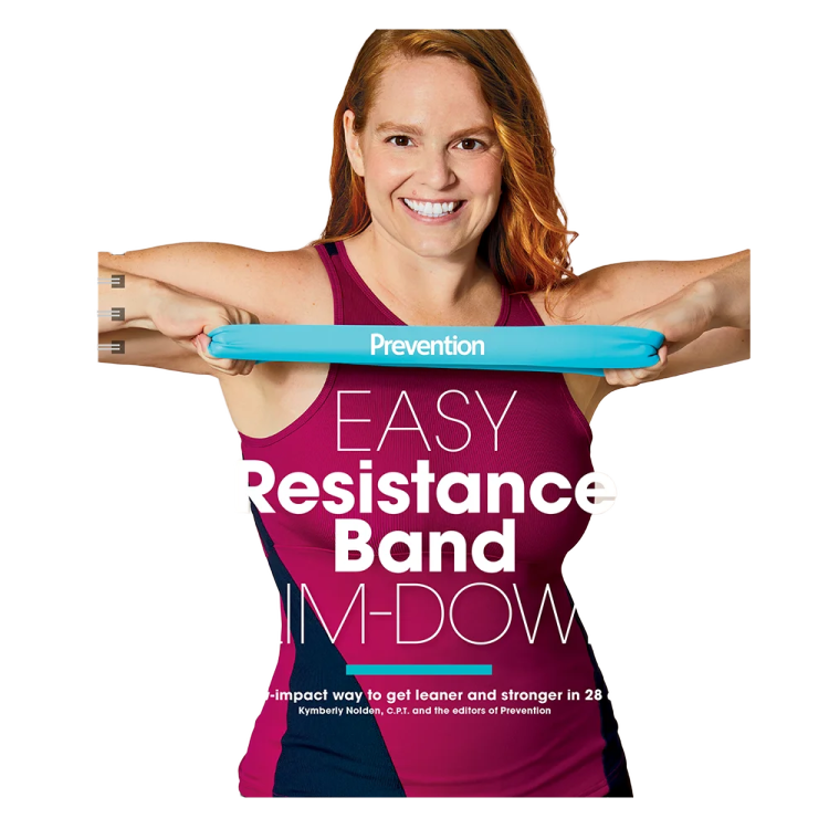 a woman in a pink tank top holding a blue yoga mat