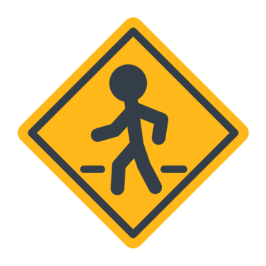 a yellow and black road sign with a person walking