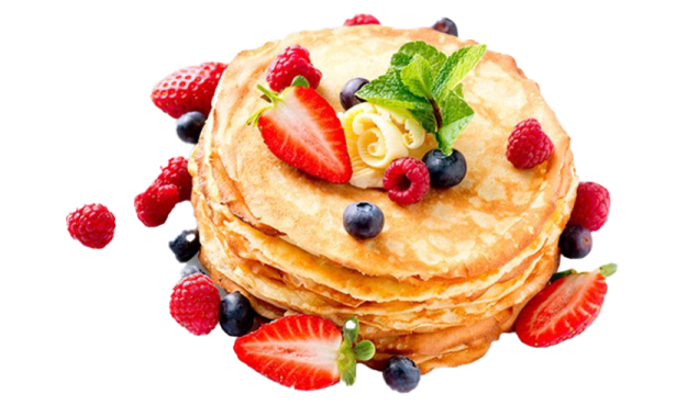 a stack of pancakes with berries and mint on top