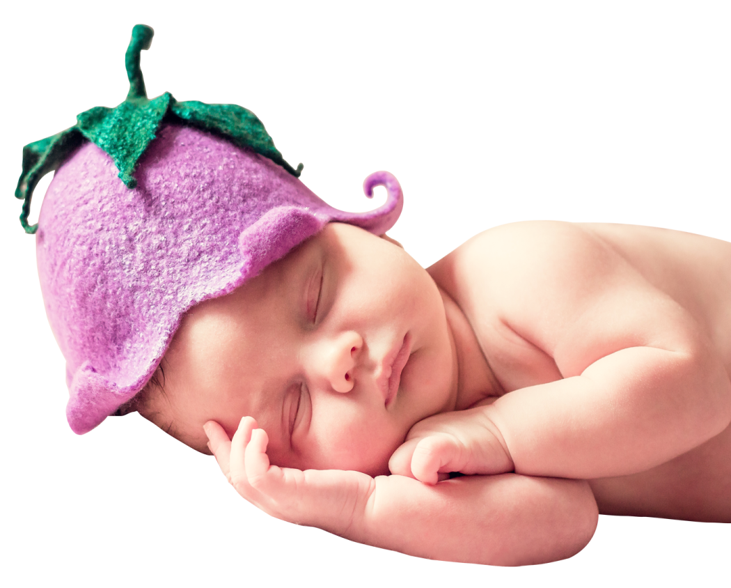 a baby sleeping in a purple hat