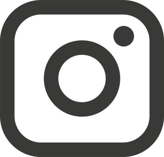 a black and white icon of a camera