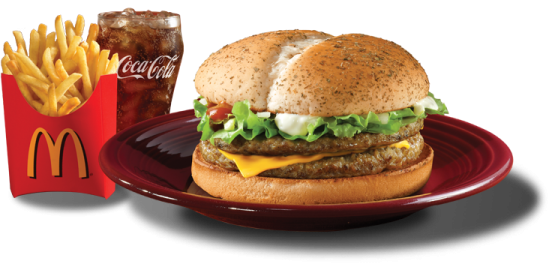 a red plate with a hamburger and fries on it
