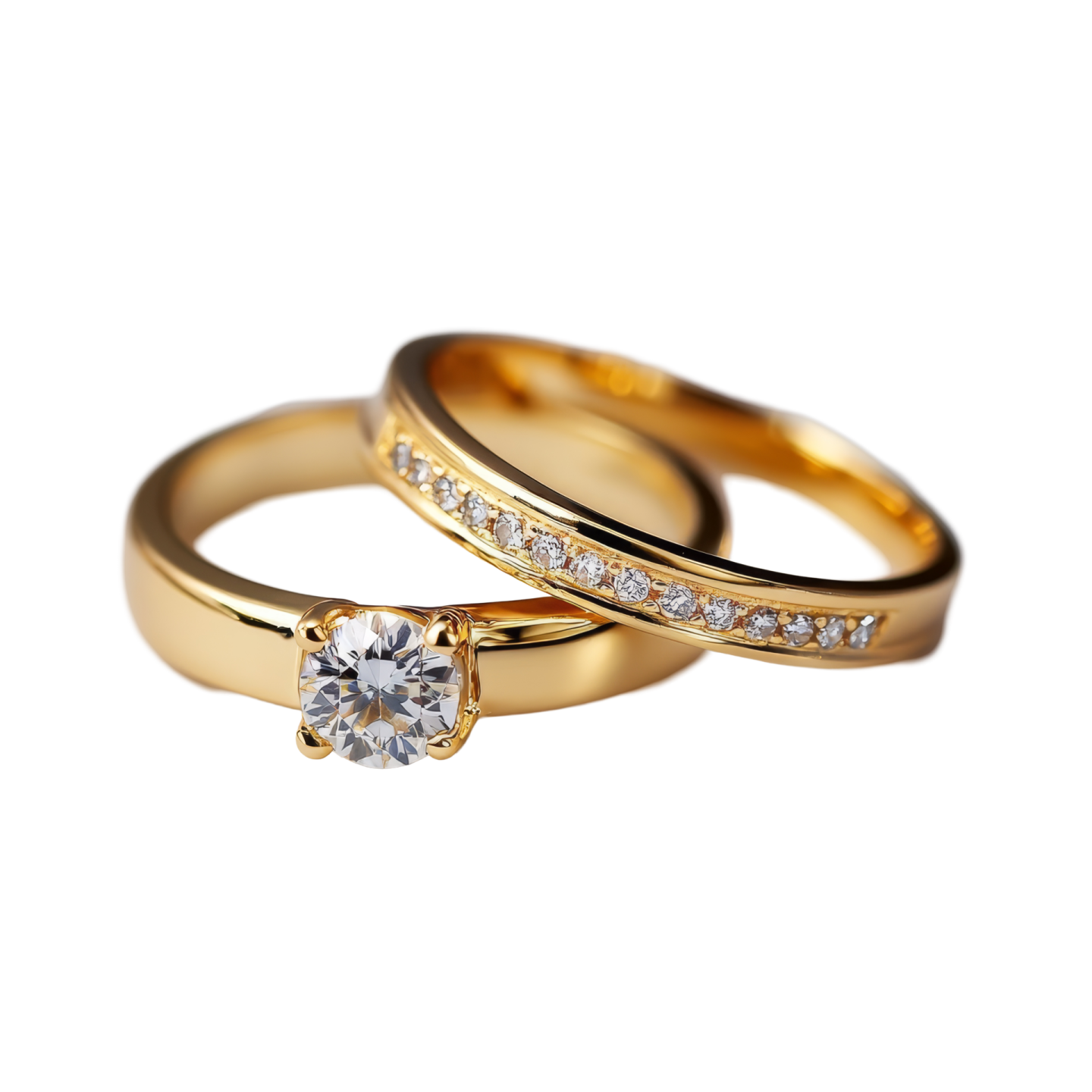 a pair of gold wedding rings with diamonds