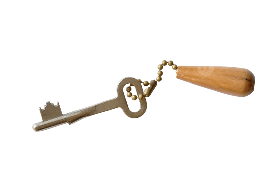 a metal key with a wooden handle on it