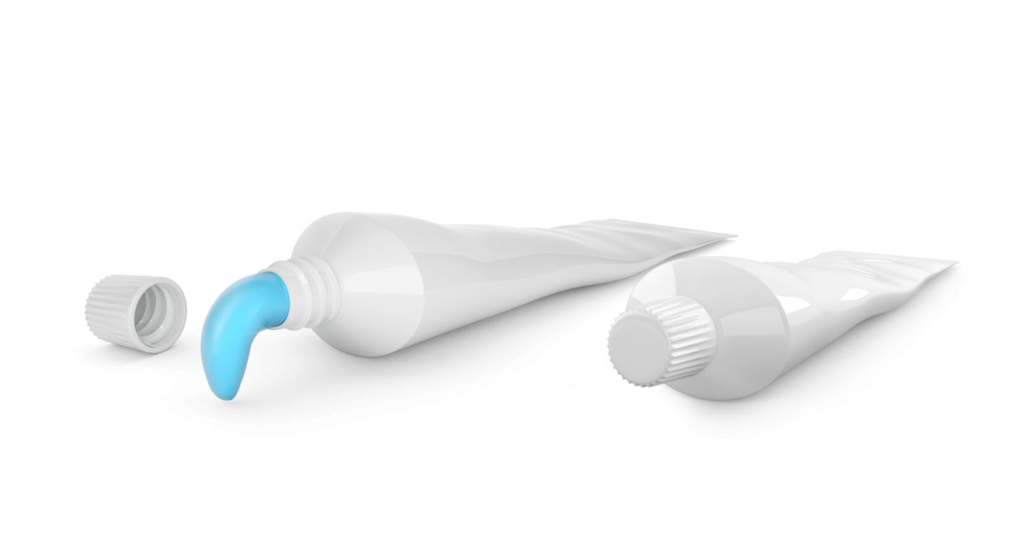two white plastic bottles with blue caps
