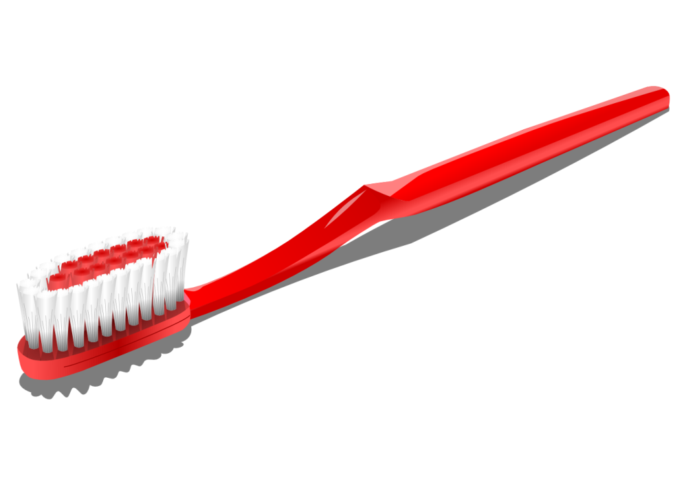 a red toothbrush on a white background