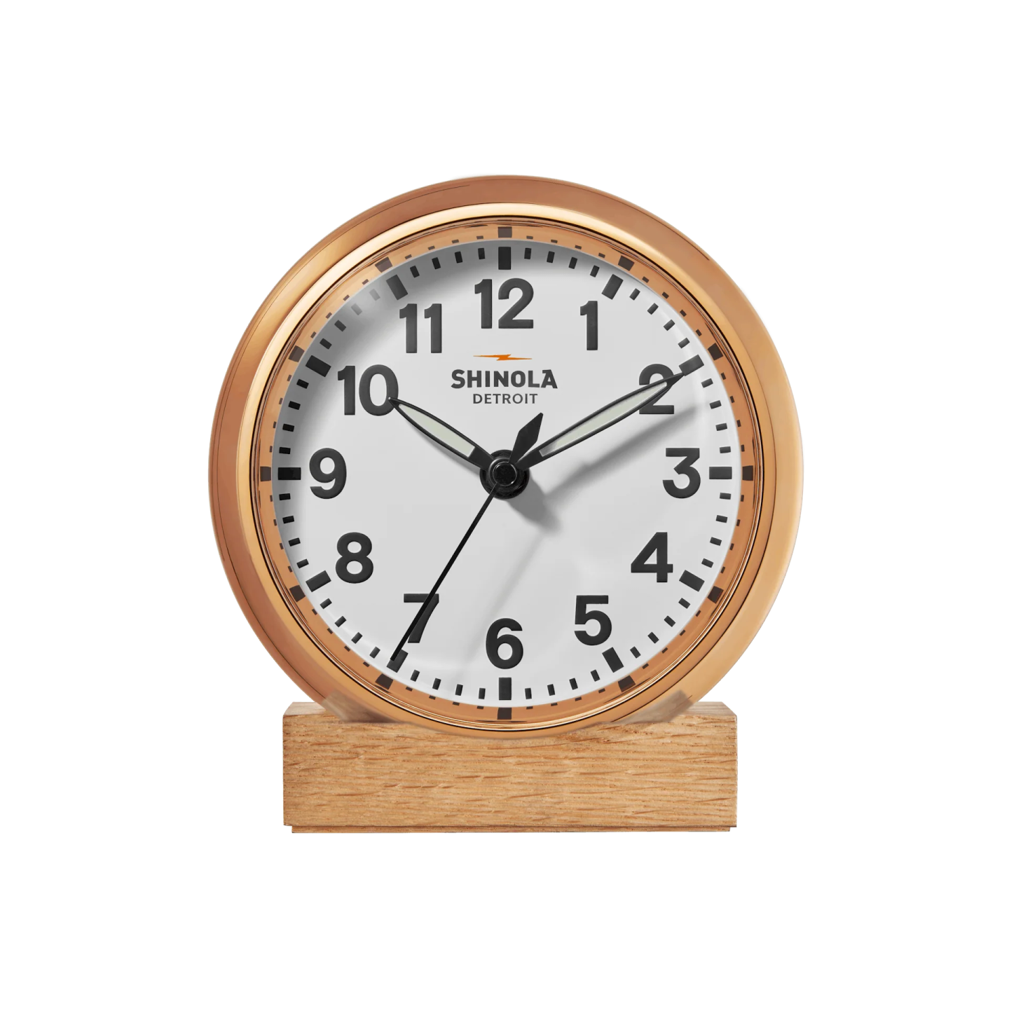 a wooden clock on a white background