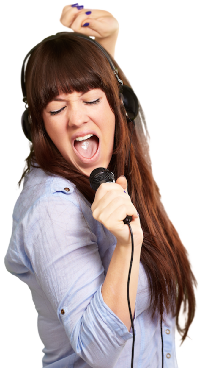 a woman with headphones singing into a microphone