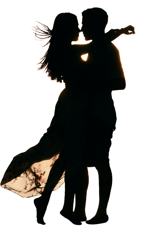 silhouette of a man and woman dancing