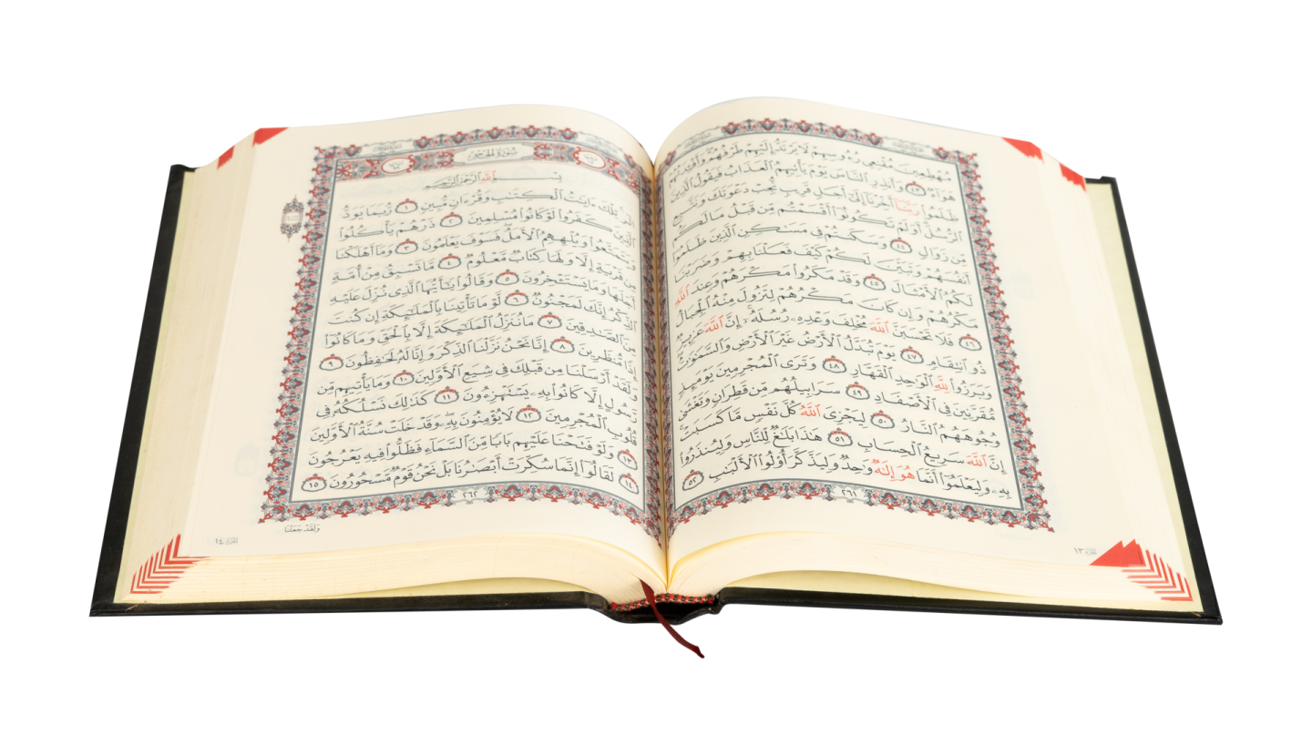 an open quran on a white background