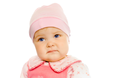 a small child wearing a pink hat and vest