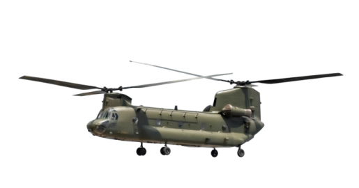 a military helicopter flying through the air