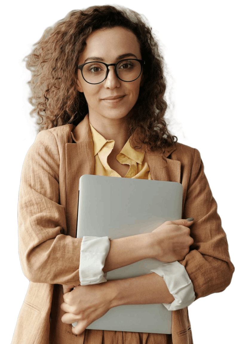 a woman wearing glasses and holding a laptop