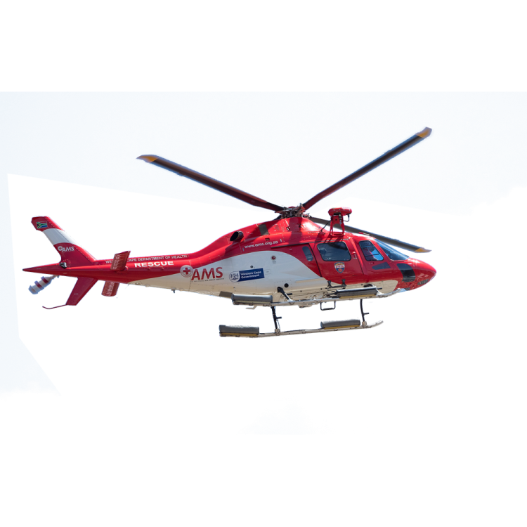 a red and white helicopter flying in the sky