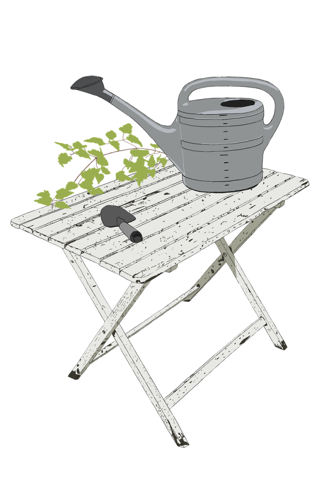 a garden table with a watering pot on top of it
