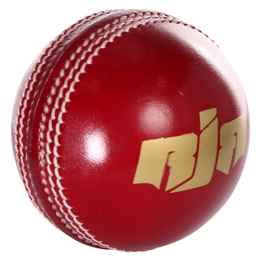 a red cricket ball with a gold logo on it