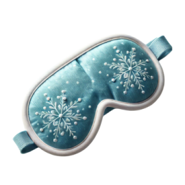 a blue eye mask with snowfls on it