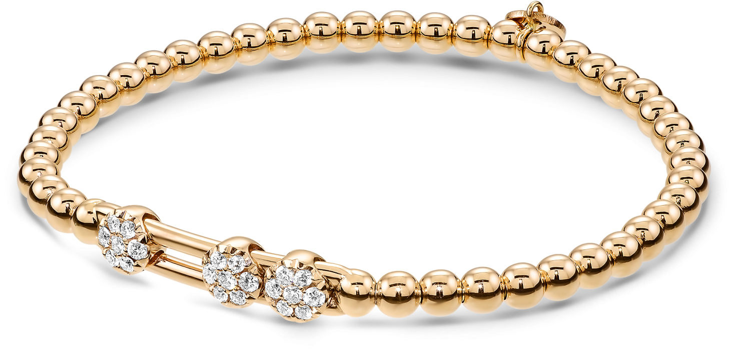 a gold bea bracelet with diamonds