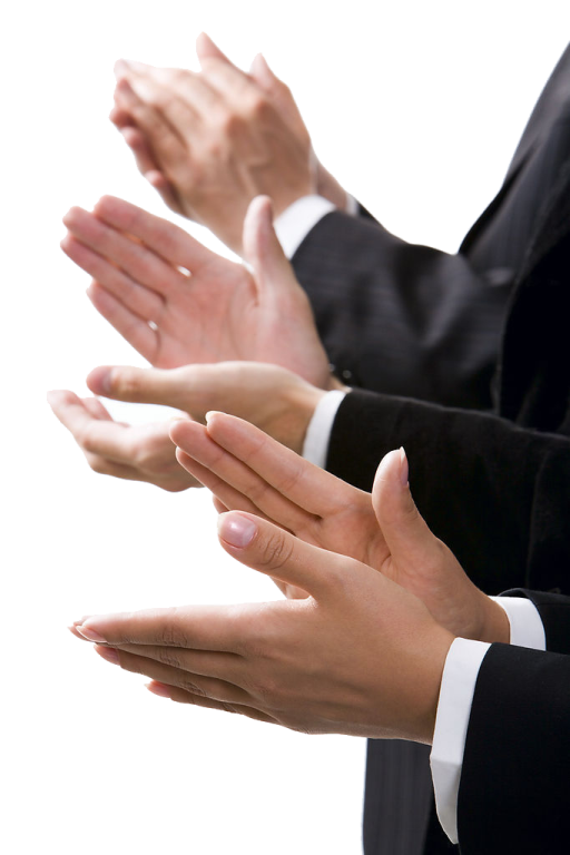 a man in a suit and tie holding his hands out
