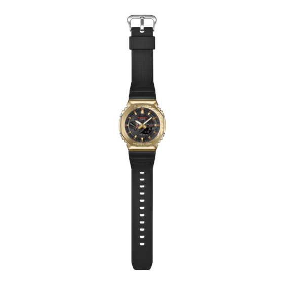 a black and gold watch on a white background