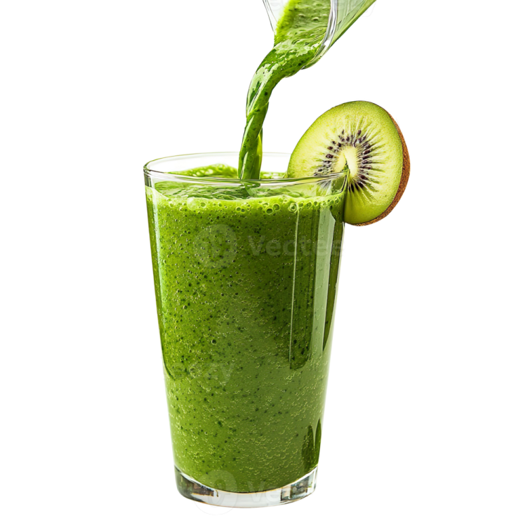 a glass filled with green smoothie next to a kil