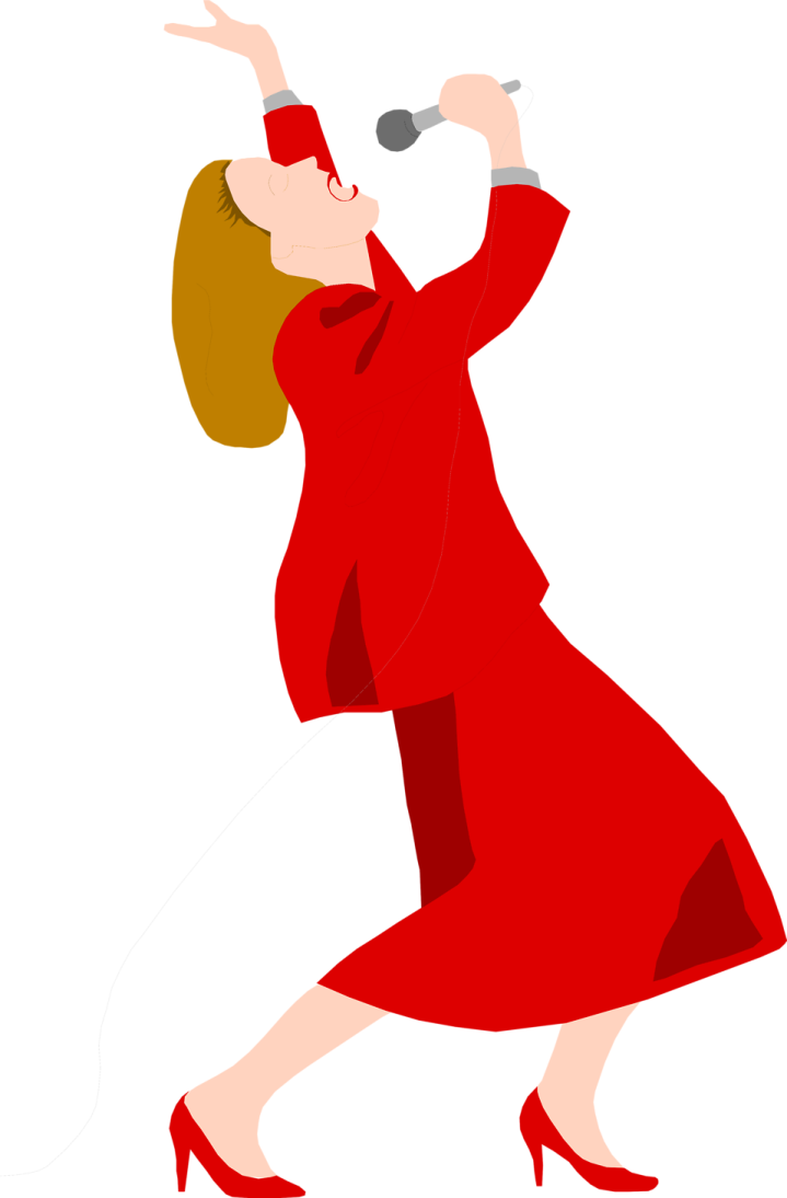 a woman in a red dress singing into a microphone