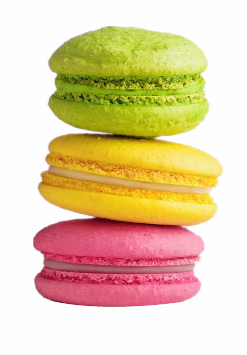 a stack of colorful macaros on a white background