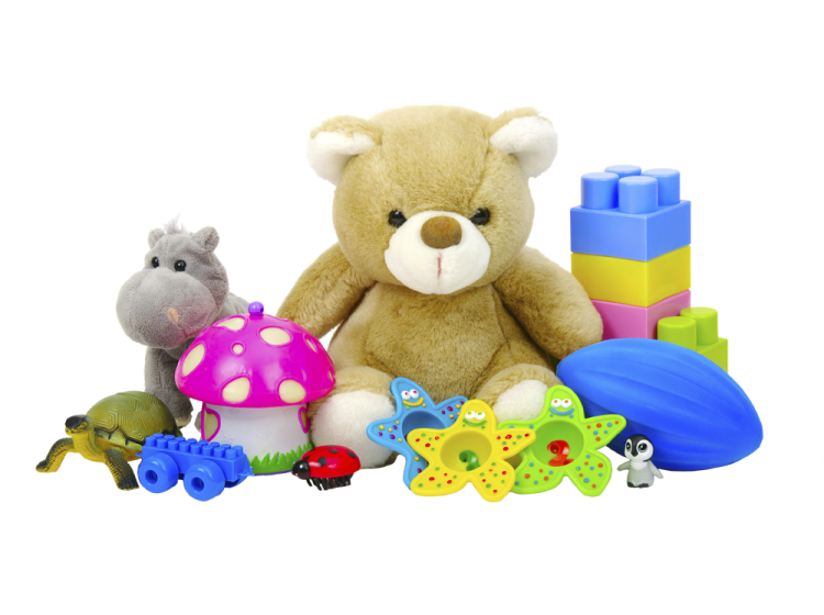 a teddy bear surrounded by toys on a white background